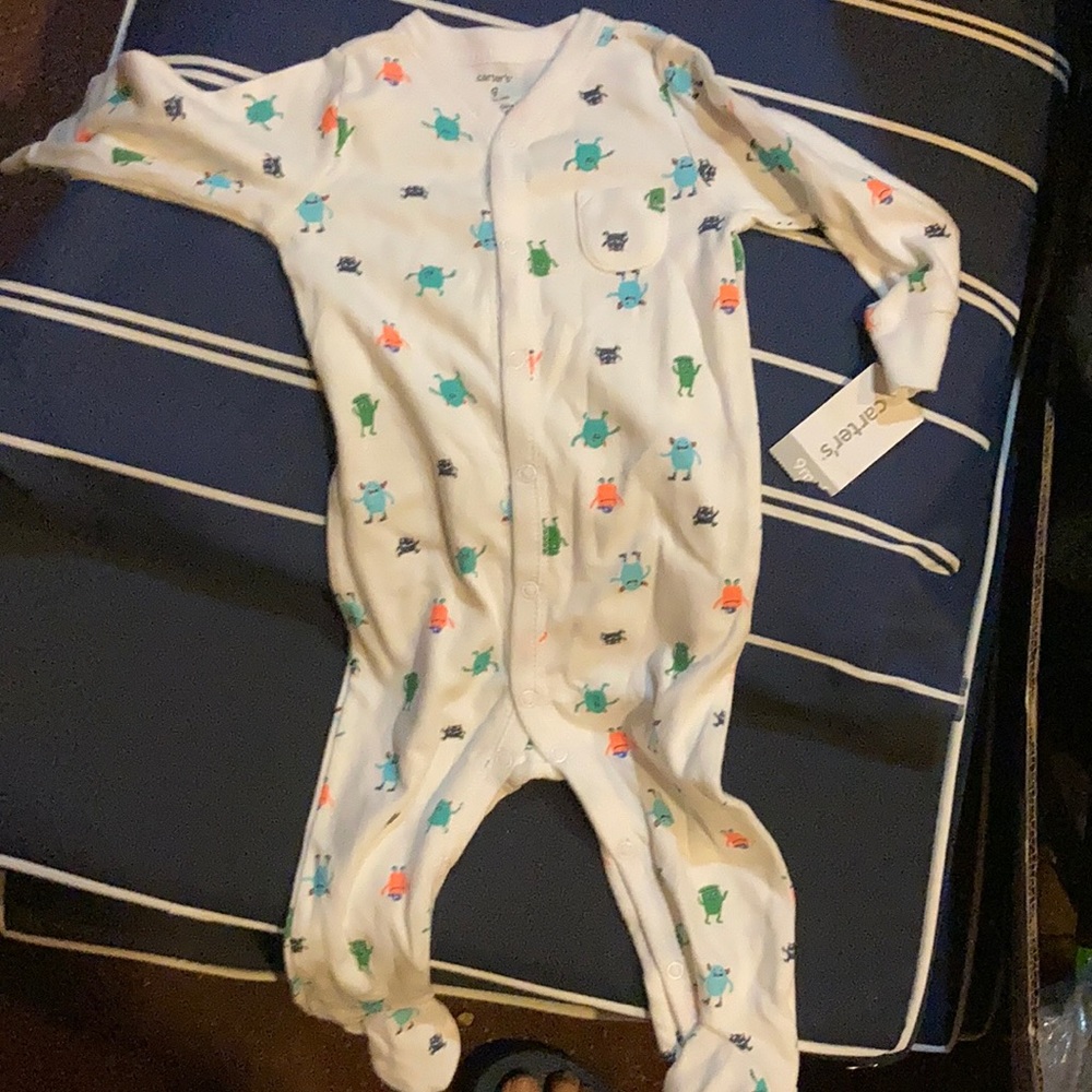 NWT CARTER’s snap button up pajamas. 9M. Never worn